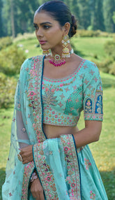 Contrasting Designer light blue lehenga on viscose with Zari, Hand, Thread, embroidery detailed work indian aspired work